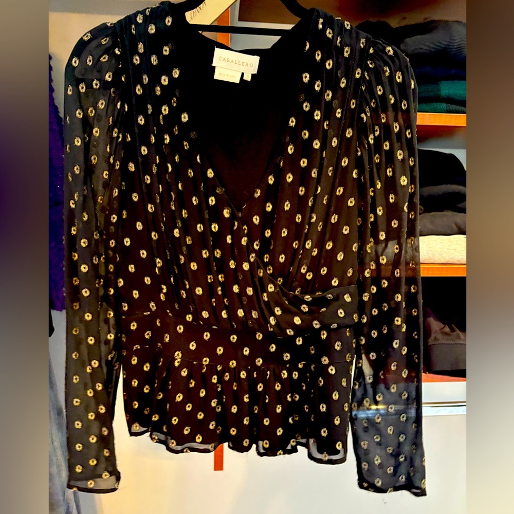 Caballero v-neck peplum top!